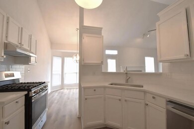 Kitchen featuring appliances with stainless steel