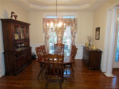 Elegant Formal Dining Room is complimented by Colu