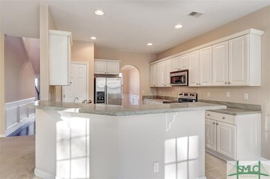 Kitchen toward foyer and Dining Room