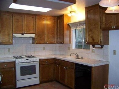 Kitchen area with skylight.
