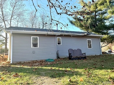 View of home's exterior featuring a yard