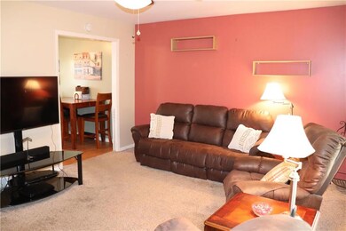 Spacious Living Room that is filled with natural l