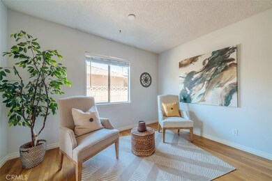 Original dining area off of kitchen, currently used as a sitting area in Living room.