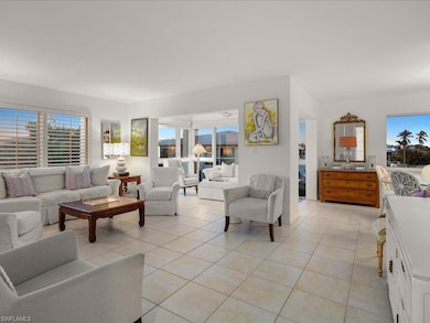 Living room featuring light tile patterned floors