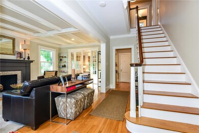 Majestic Staircase off of living room.