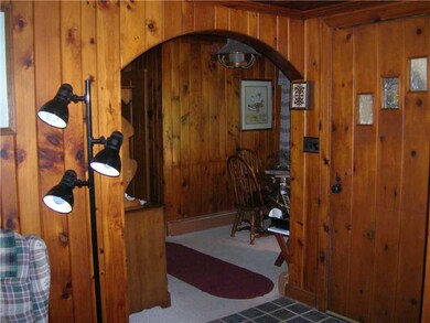 Living Room. Doorway into Dining room. the knotty 