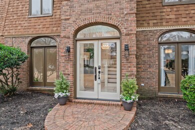 Doorway to property featuring french doors