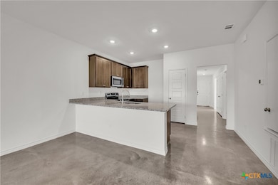 Please Note: These interior photos are not of the actual home but are of a completed one with a similar floor plan. Finishes, features, and layouts may vary.