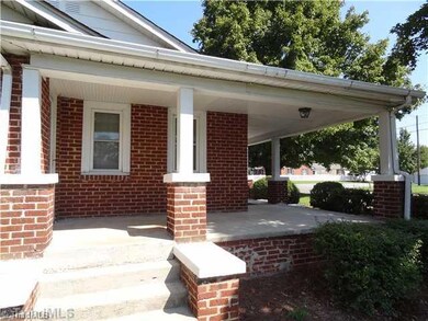 Exterior Front. Great times on wrap around front porch.