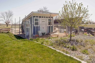View of outbuilding with a sunroom