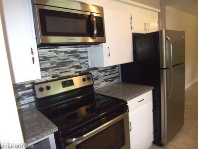 Kitchen. Stainless steel appliances to remain.