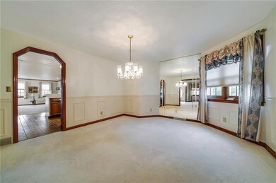 Dining room with wainscoting .