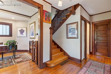 Entry with main level office or library