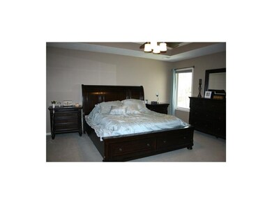 Relax at the end of your day in your master suite.