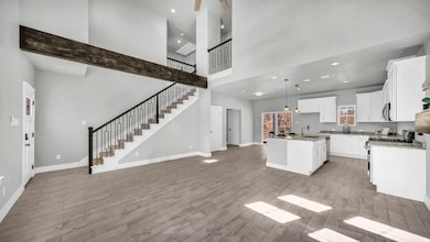 Kitchen with light wood-style flooring, a kitchen 