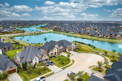 This fantastic cul-de-sac location boasts water views from both front and back yards!