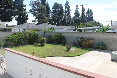 Fenced backyard with fruit trees, and side door ac