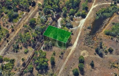 Aerial view of property's location with property b