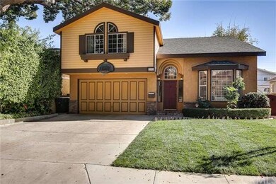 Front of the house with new landscaping and its ow
