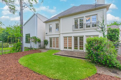 Private patio area with a fenced-in yard space