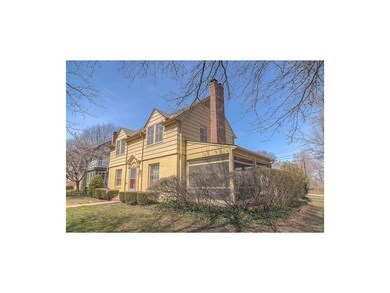 Screened porch off living room walks out to brick 