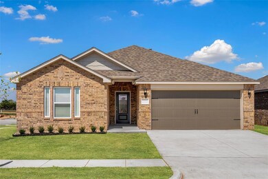Step into your dream home! This charming brick-fro