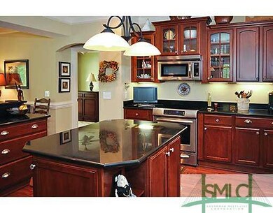 Kitchen. Beautiful open kitchen with rich cherry c
