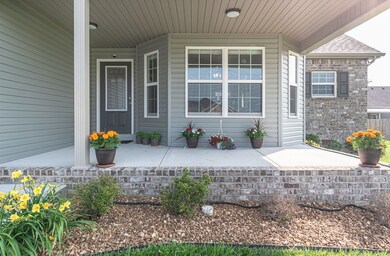 Look at this beautiful front porch! *Seller is replacing dead plants damaged by the last frost. They have been ordered.*