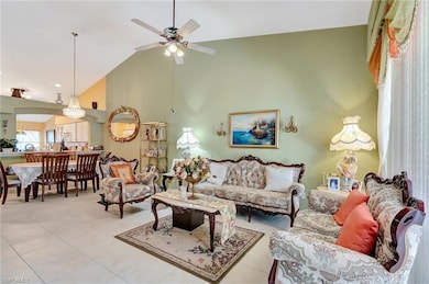 Living area featuring high vaulted ceiling, ceilin