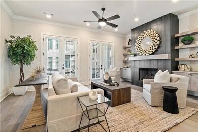 The open concept layout with high ceiling and larg