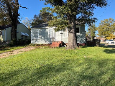 View of front of property with a front lawn