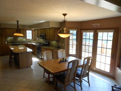 Plenty of room here for dining - french doors to d
