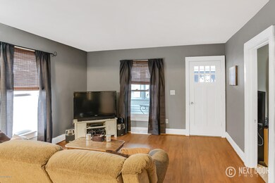 Living area and door is to porch