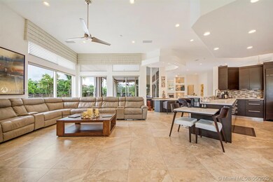 Family room with electric blinds for easy opening and closing