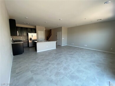 another view of the kitchen, dining living combo.
