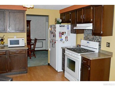 Kitchen. Kitchen work area and entrance view of fo
