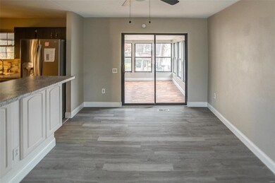 Dining room leading to sunroom