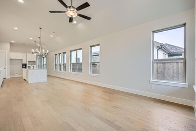 Unfurnished living room with vaulted ceiling, sink