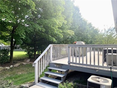 Wooden terrace featuring central air condition unit