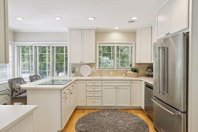 Kitchen with nature views of front yard