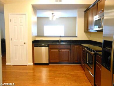 Kitchen - View of kitchen from dining room. shows pas-thru counter from family room.