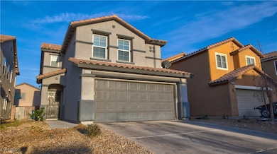 Mediterranean / spanish home with driveway, stucco