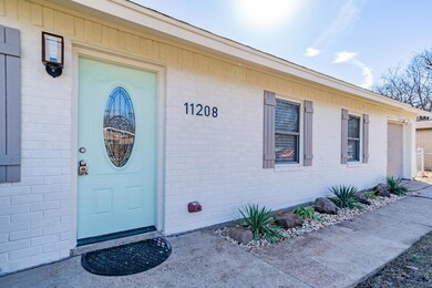 Doorway to property with brick siding