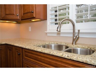 Granite, undercounter lighting, plantation shutter