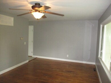 Large living room with hardwood floors