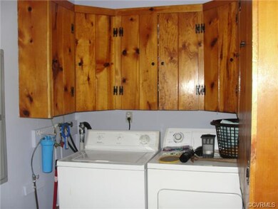 Utility room with built-in cabinets