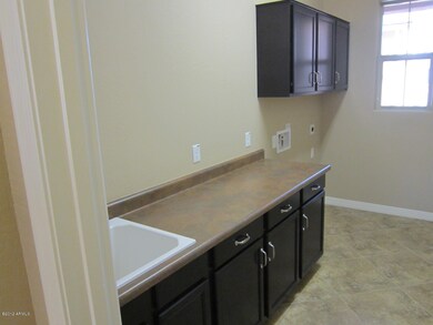 Laundry room with utility sink