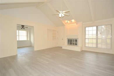 Enjoy a spacious family room with soaring vaulted