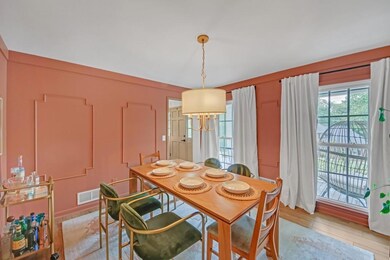 Dining space with light wood-type flooring