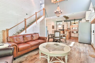 Living room featuring light hardwood / wood-style 